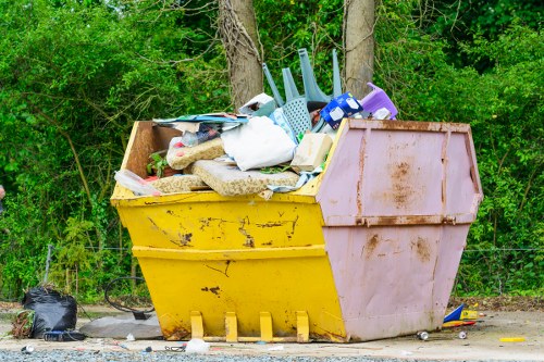 Enclosed and lockable skip parked in a residential area in Hounslow