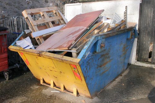 Waste removal trucks at a Hounslow construction site