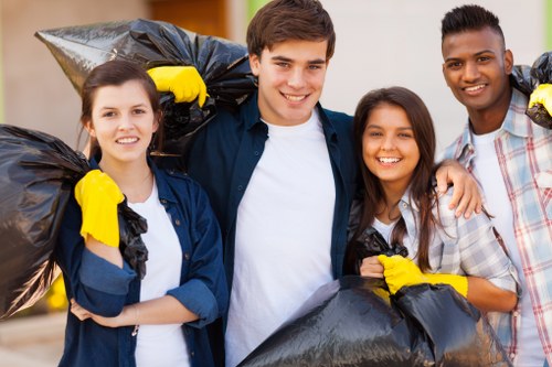 Professional staff assisting a client with skip selection